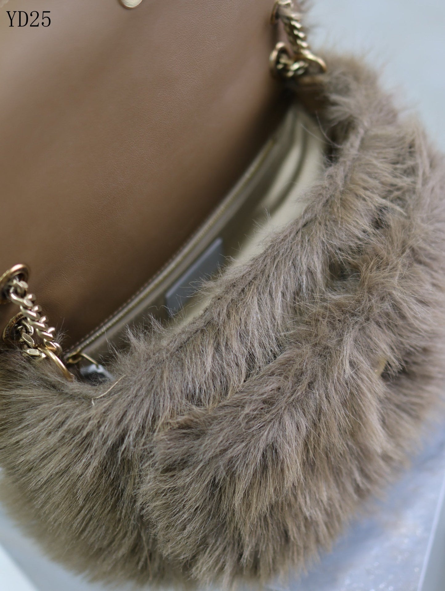 Niki Small in Shearling Bag