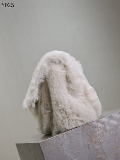 Niki Small in Shearling Bag