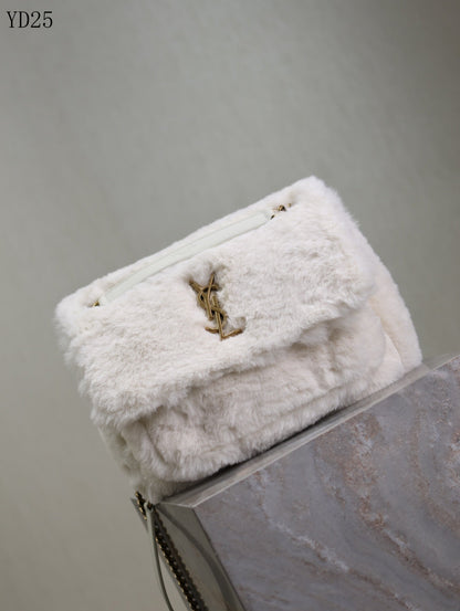 Niki Small in Shearling Bag
