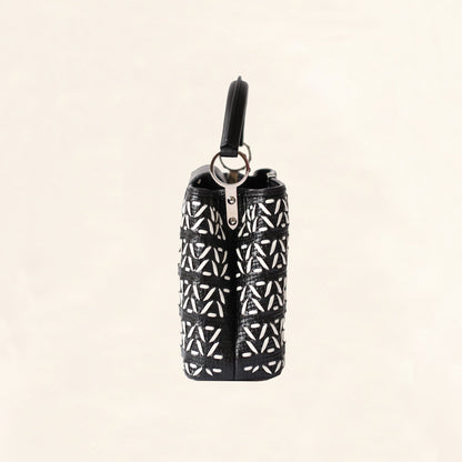 Louis Vuitton | Black and White Plaited Leather Capucines | BB