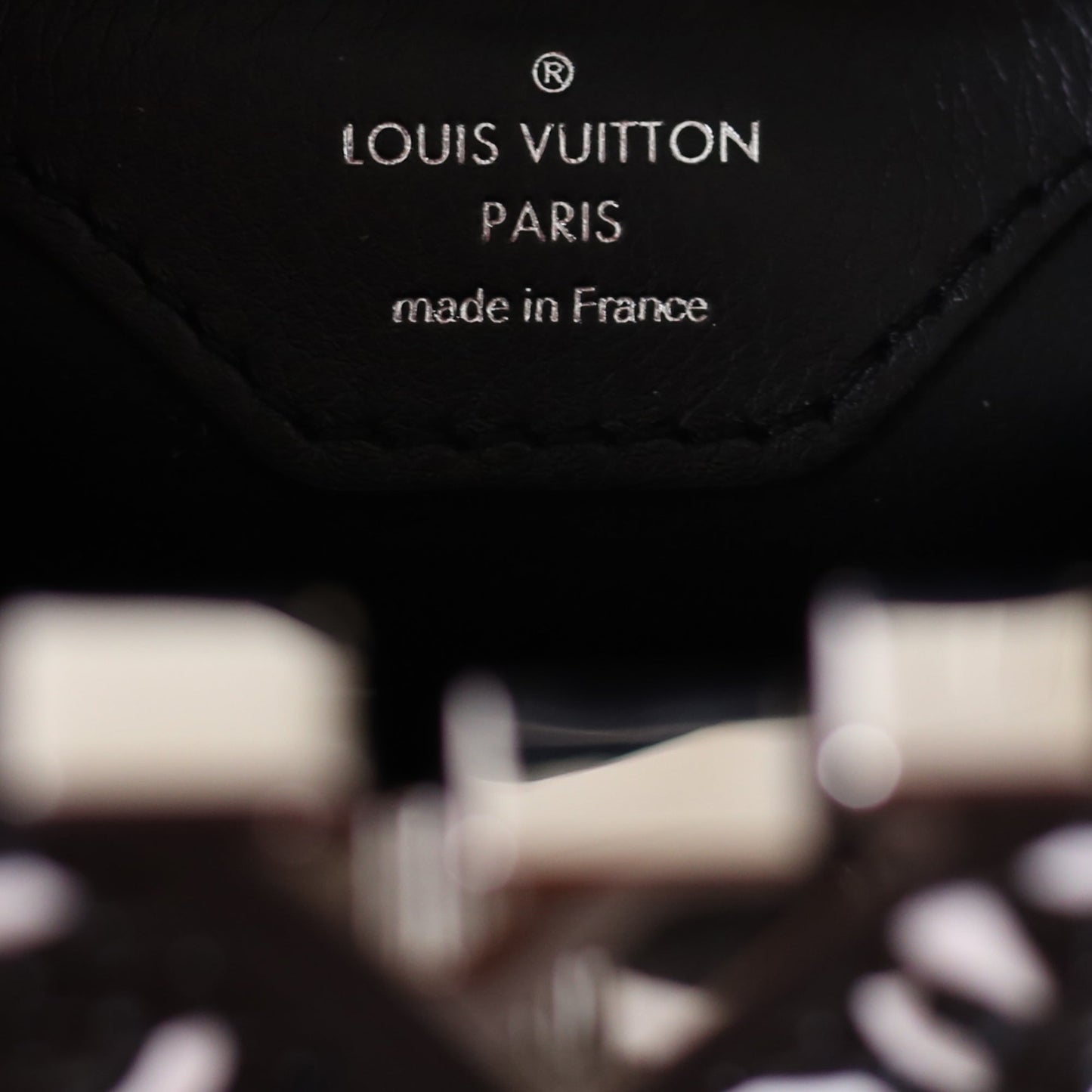 Louis Vuitton | Black and White Plaited Leather Capucines | BB